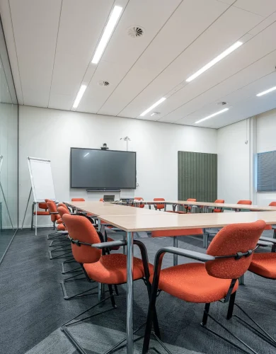 conference-room-interior-modern-office-with-white-walls-monitor (1)-min