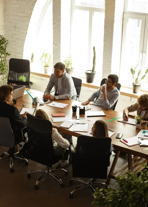 top-view-image-motivated-employees-working-together-office-representing-project-concept-business-min